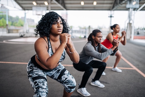 Women doing squats.