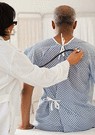 older man getting a checkup