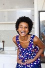 woman with blue dress laughing