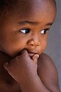 infant looking away from camera
