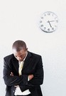 african american man with his head down appearing upset