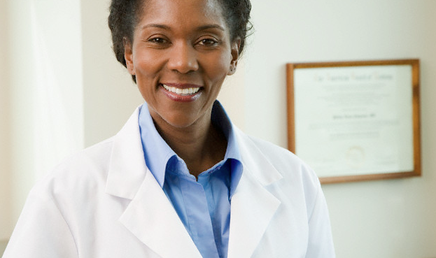 A dermatologist smiling