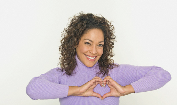 woman-making-heart-with-hands