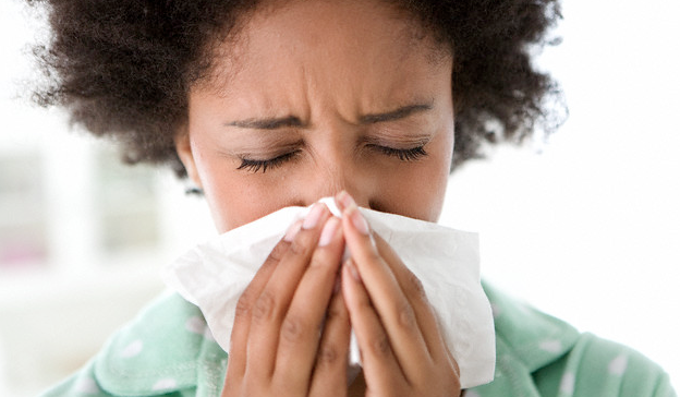 woman-blowing-nose