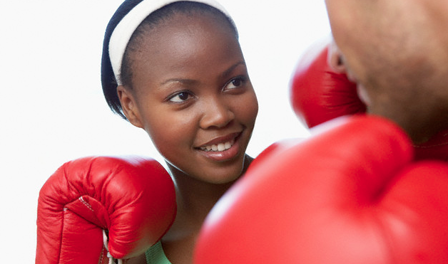 couple boxing with red gloves