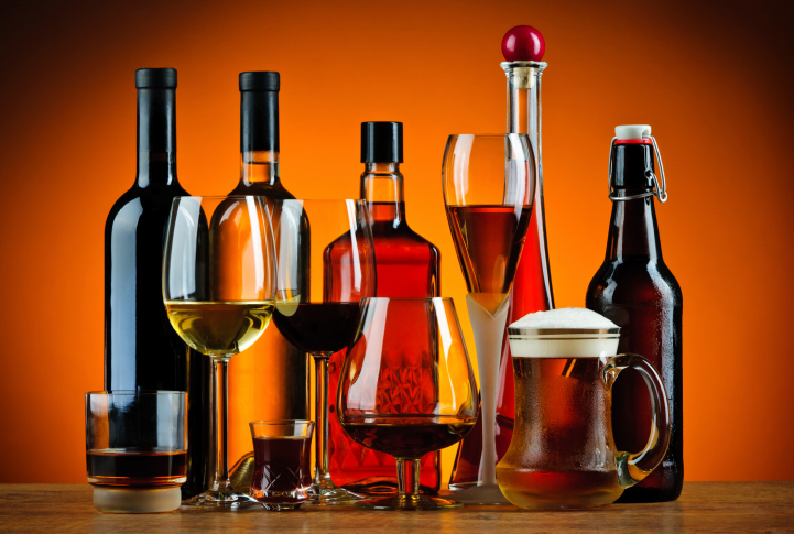bottles and glasses of alcohol drinks