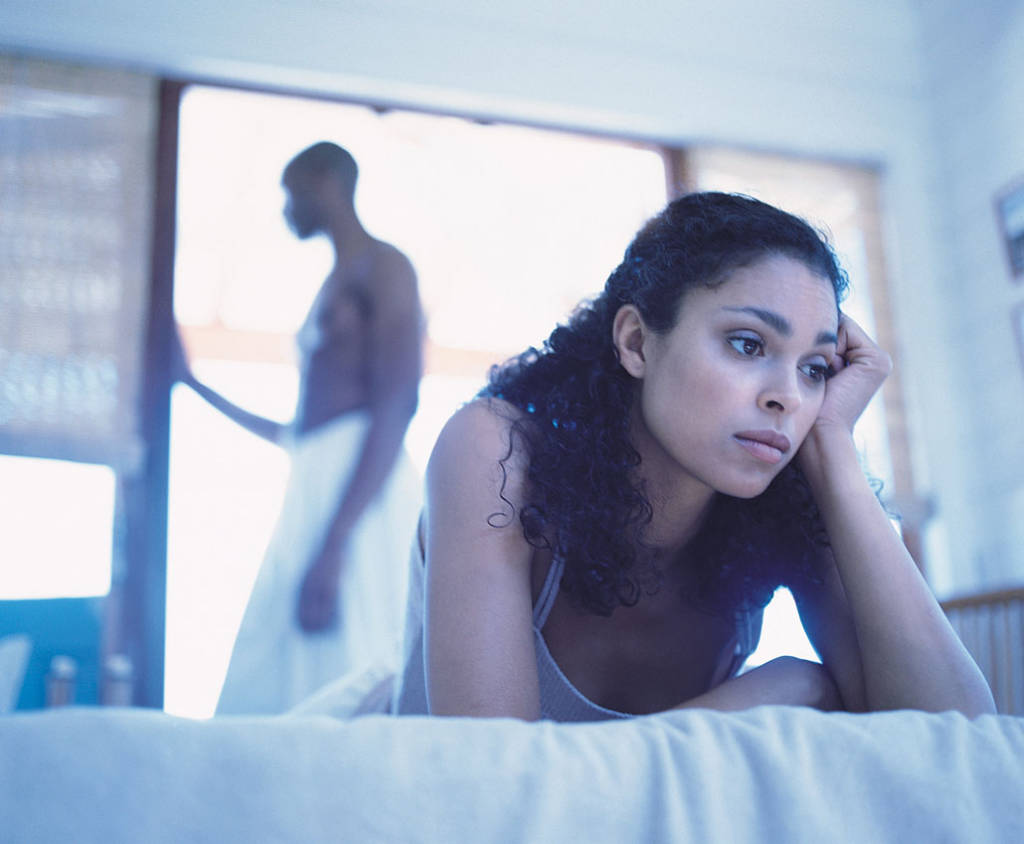couple in bed upset