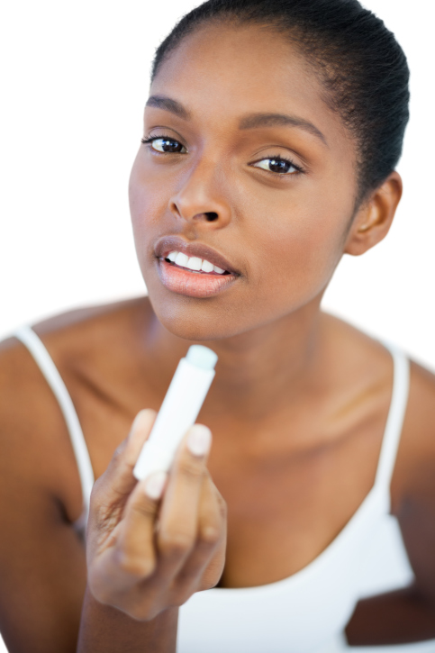 woman with lip balm