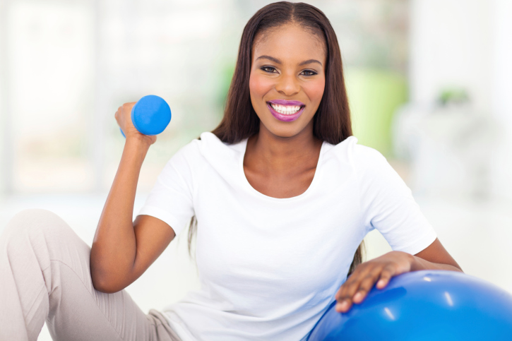 woman with dumbbell