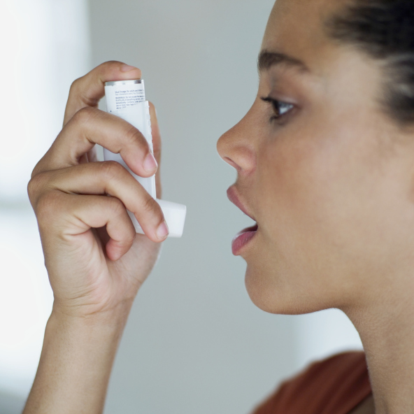 woman with inhaler
