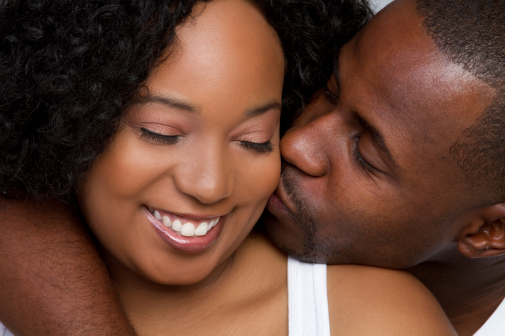 couple kiss on cheek