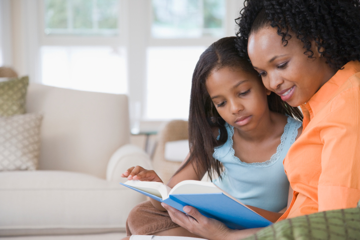 woman and child reading