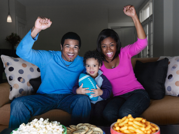 Family Watching Football