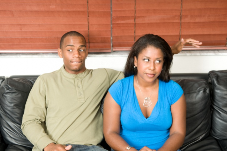couple on couch nervous