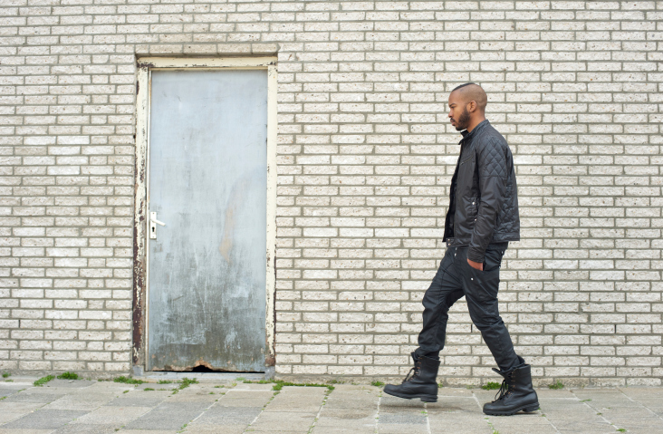 african american man walking outside