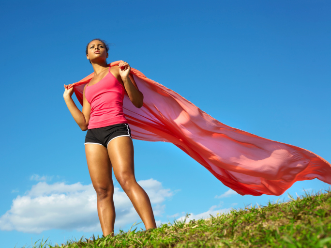 woman standing with scarf in wind