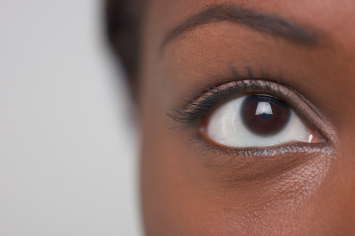 woman left brown eye