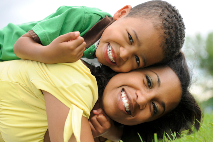 mother and son playing outside