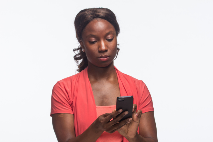 woman texting on her phone