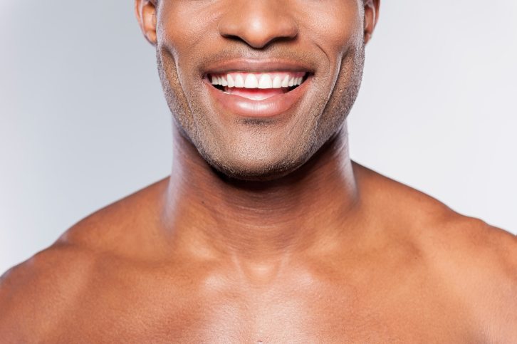 African American man smiling with white teeth