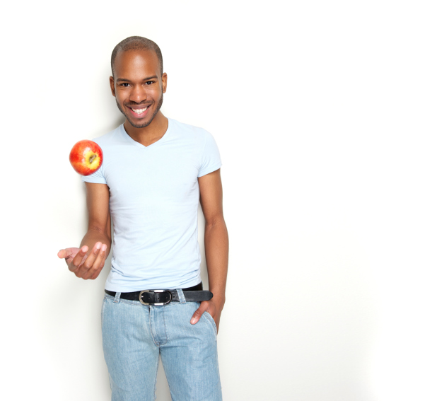 smiling man with apple