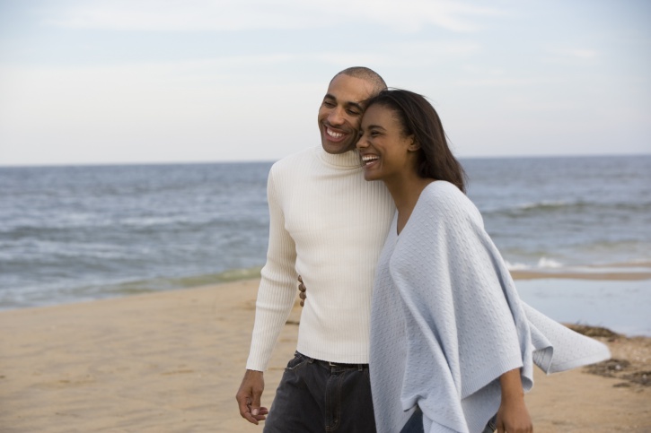Couple walking on a beach