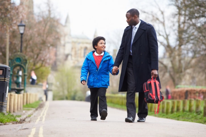 Father Walking Son To School