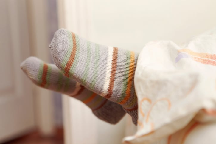 Socks in bed.