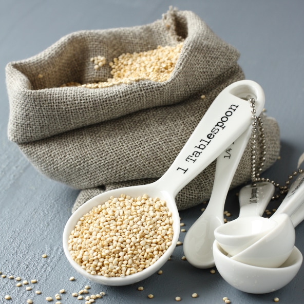 quinoa in measuring spoon