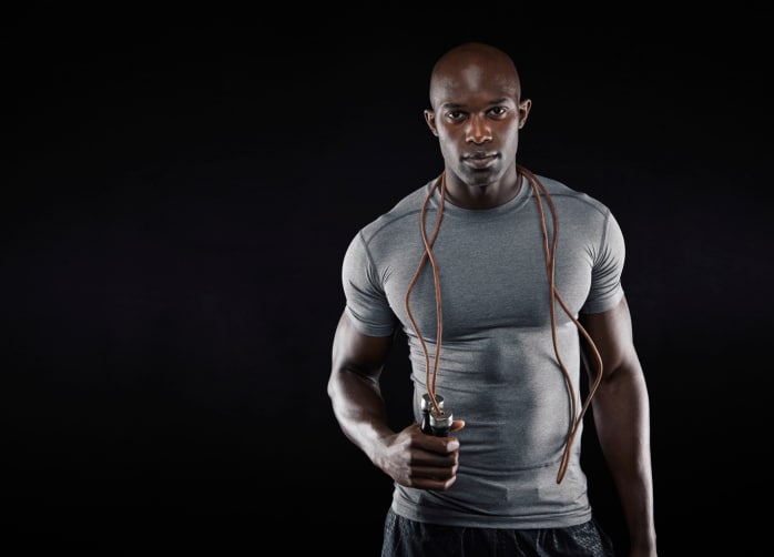 African American Black muscular man with jumping rope