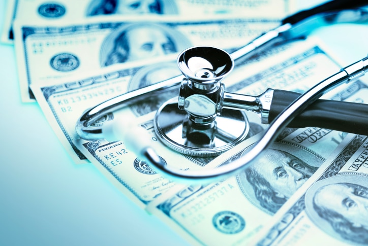 money with doctor stethescope