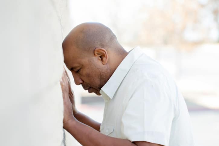 African American older man stressed