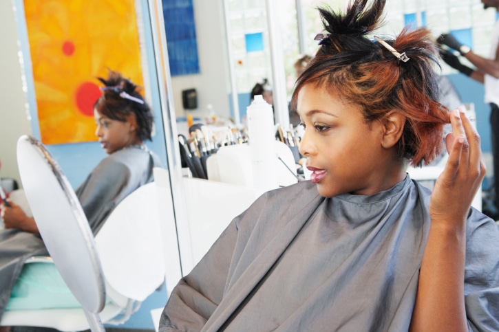 African American woman at hair salon