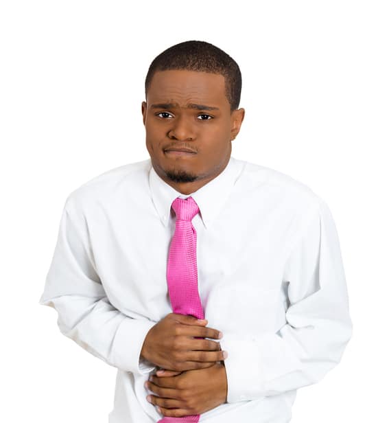 African American man stomach pain constipated