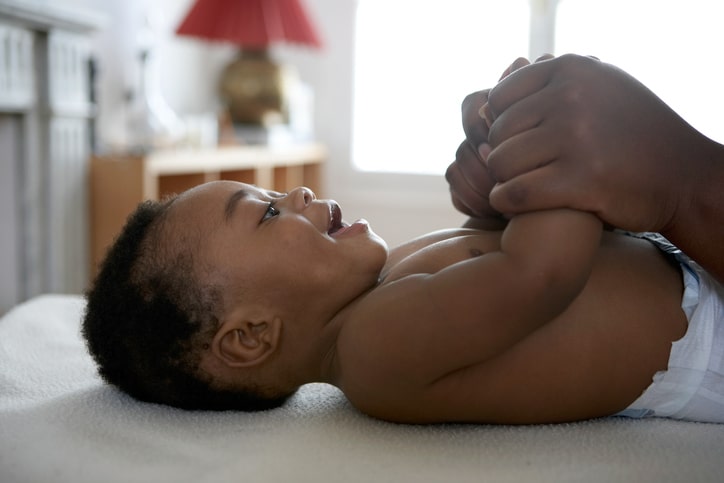 African American baby lying down