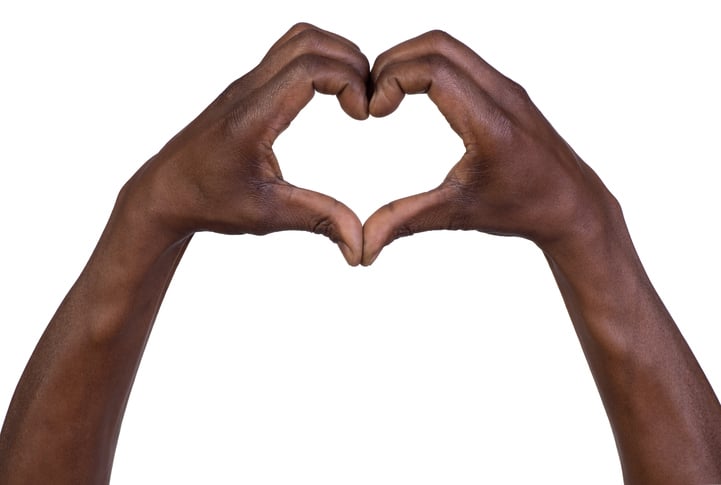Black hands in the shape of a heart