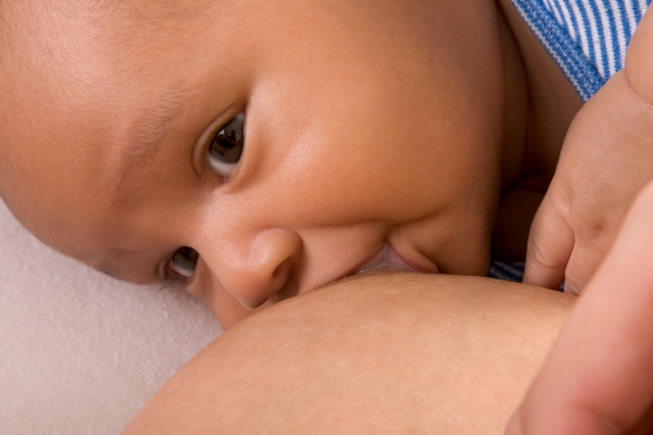 African American baby and mother breastfeeding