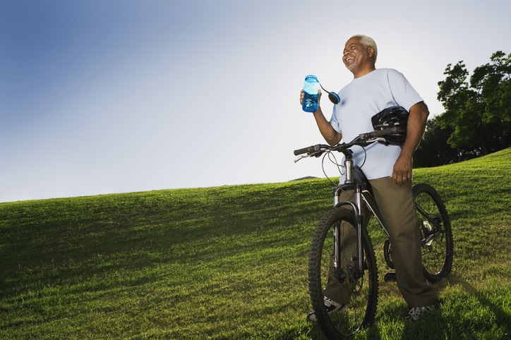 Senior African American man on bike