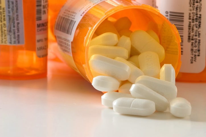 pills spilling from bottle