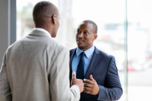 African American men talking at work