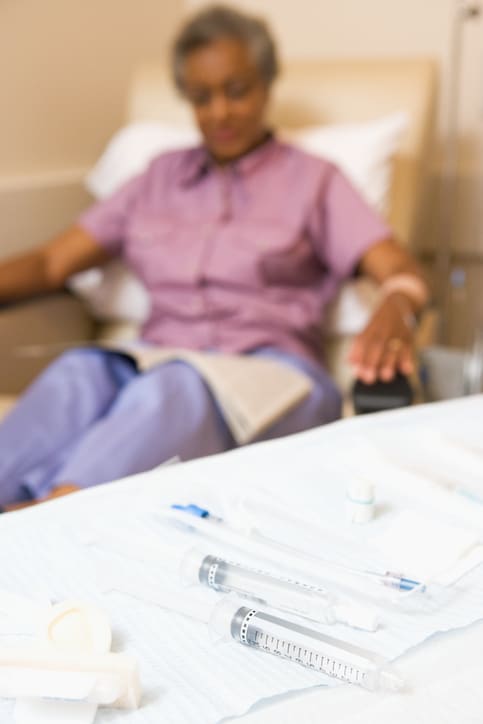 African American woman doctor office chemotherapy