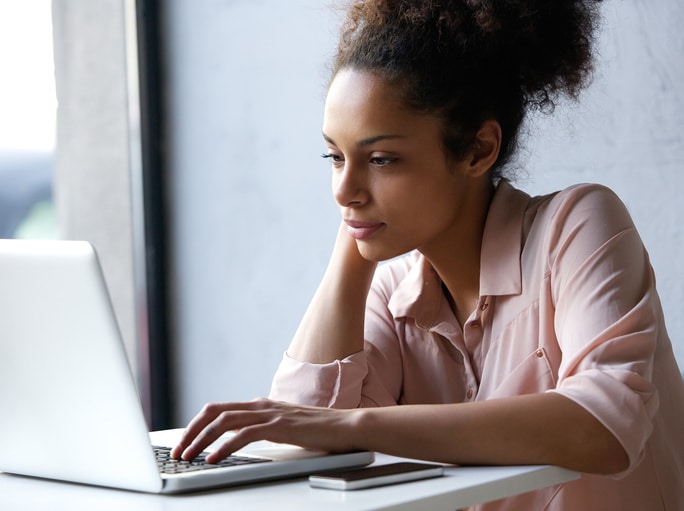 young African American woman on laptop