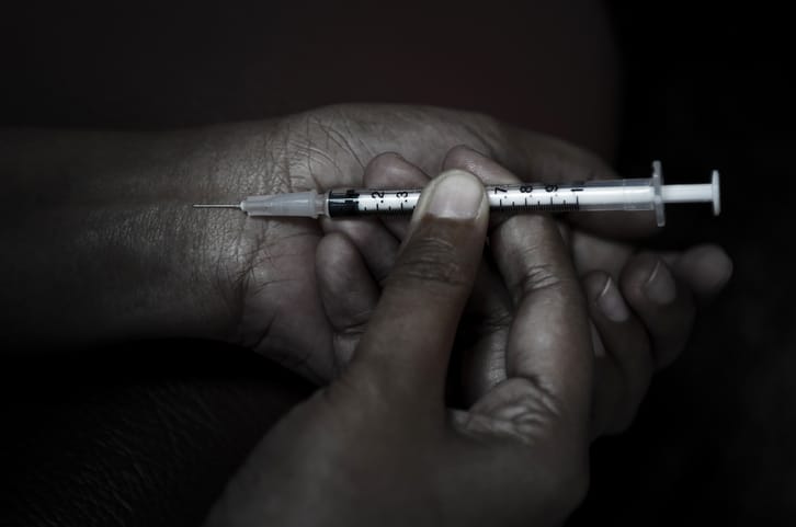 drug addict needle