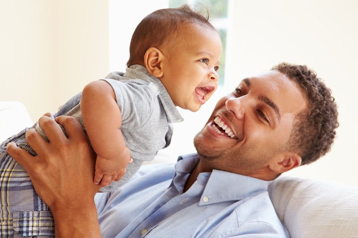 African father and baby