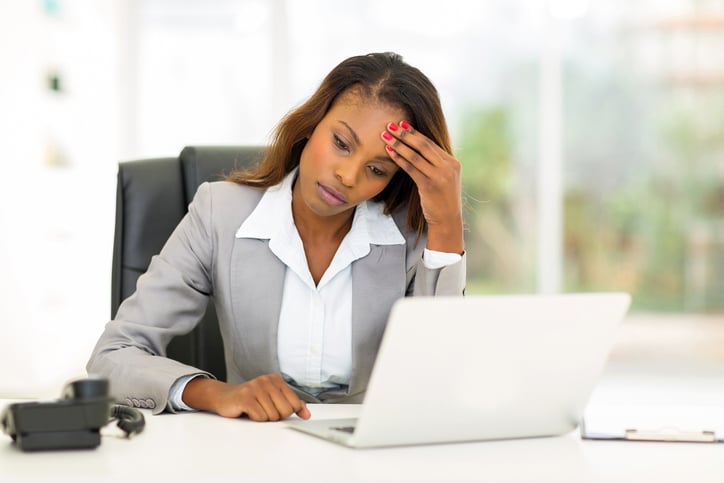 African American woman at work headache