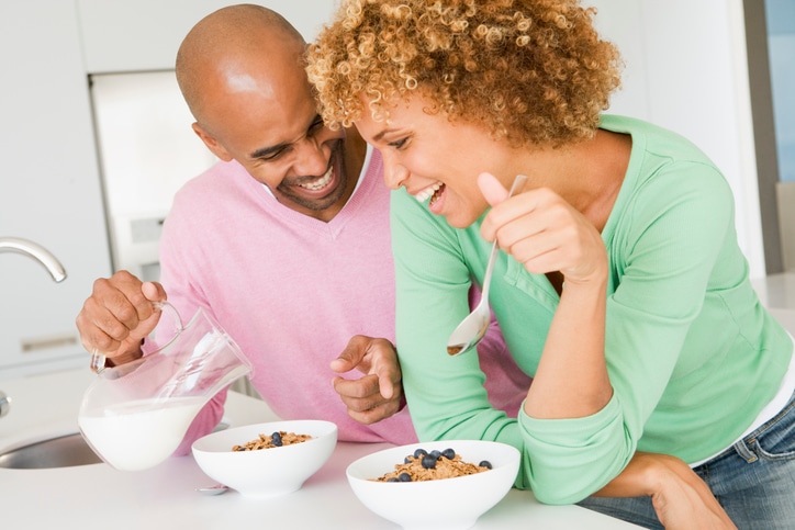 African American couple eating cereal