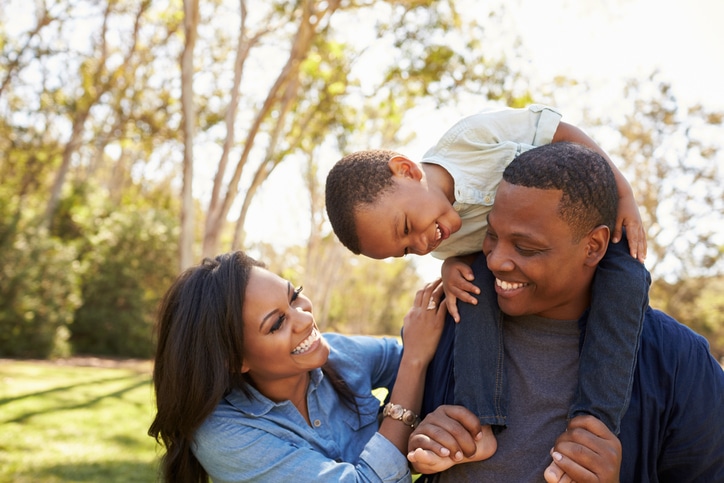 African american parents family and son outside