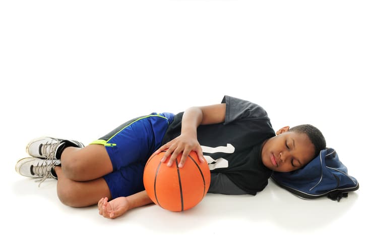 African American boy tired sleeping