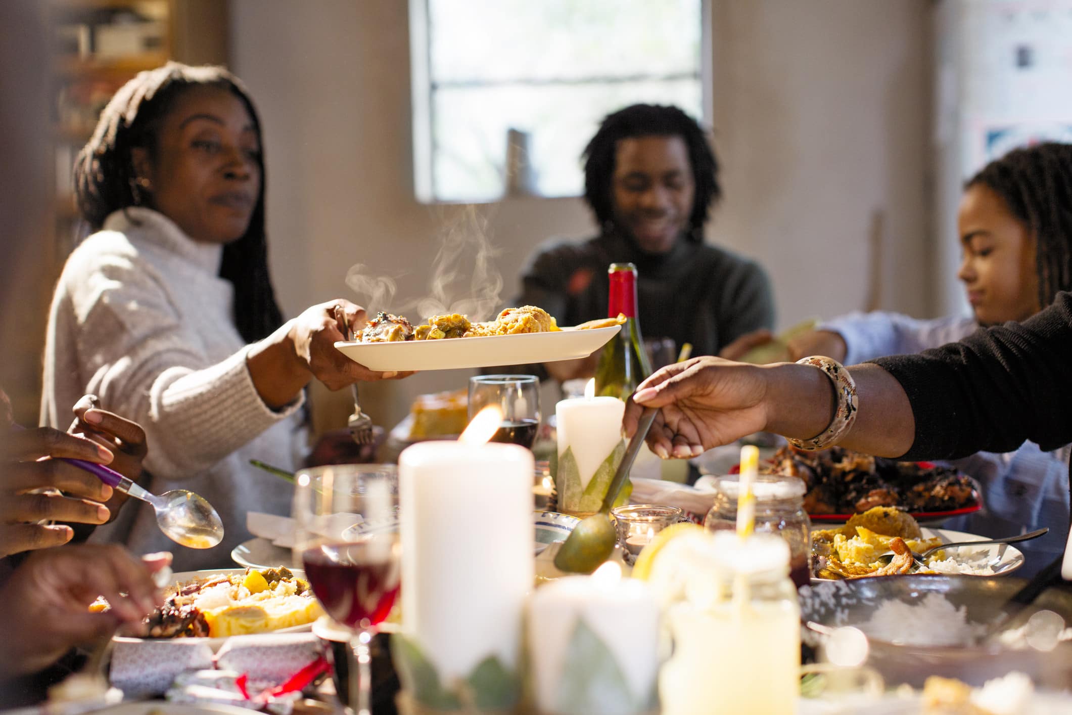 woman passing food
