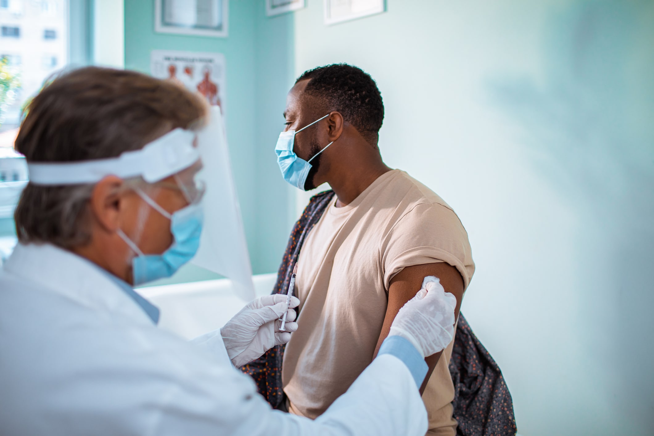 Young man getting vaccinated